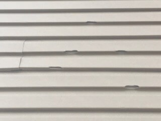 imgi_2_siding-damage-2